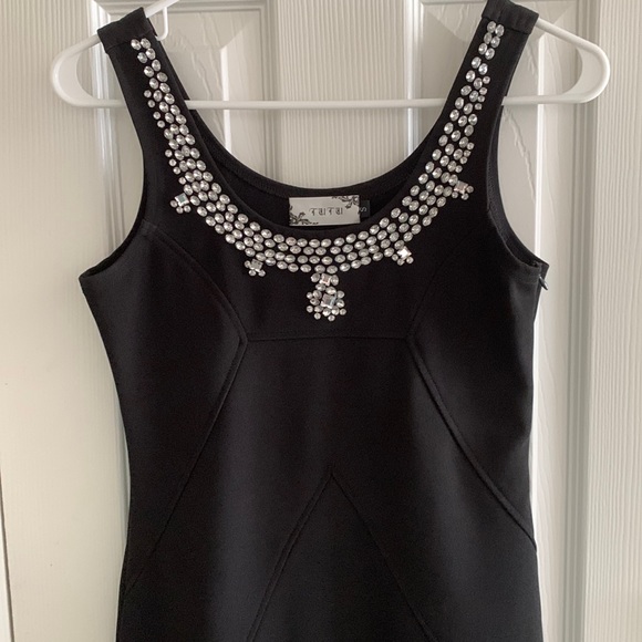 Dresses & Skirts - TUTU Mini black dress with silver collar studs.